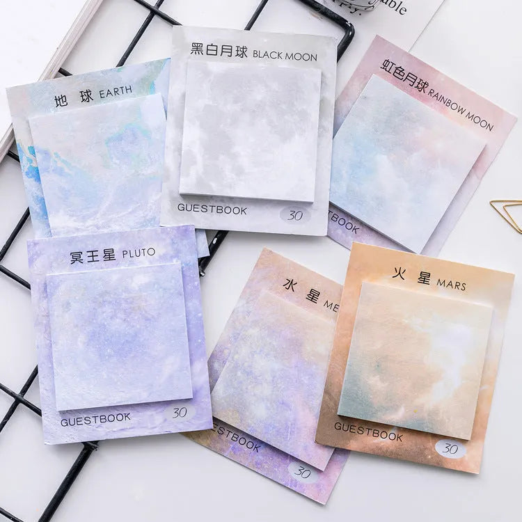 Square planet sticky notes pad with 7.3cm dimensions showing oil painting artwork of Earth, Mars, and moon designs