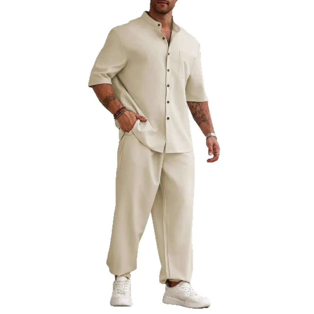 Men's apricot coloured cotton linen short sleeve shirt and trouser casual set laid flat.