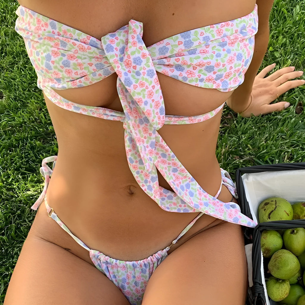 Women's lace-up front swimsuit with wireless bra and split-leg design in floral print