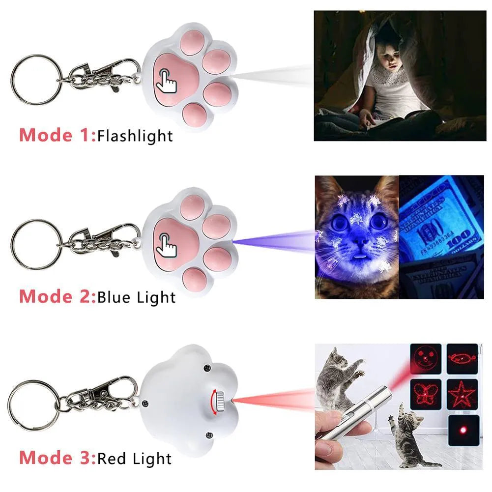 Infrared cat teaser toy with key chain lighting function in black or pink plastic construction