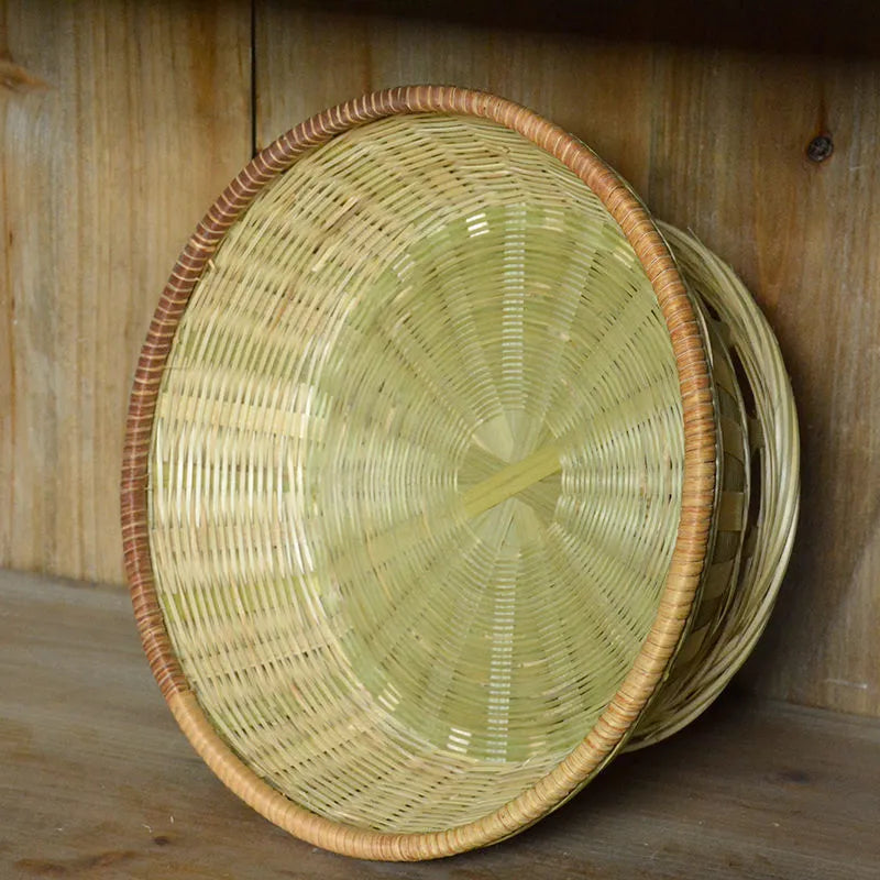 Handwoven natural bamboo storage basket showing three size variations