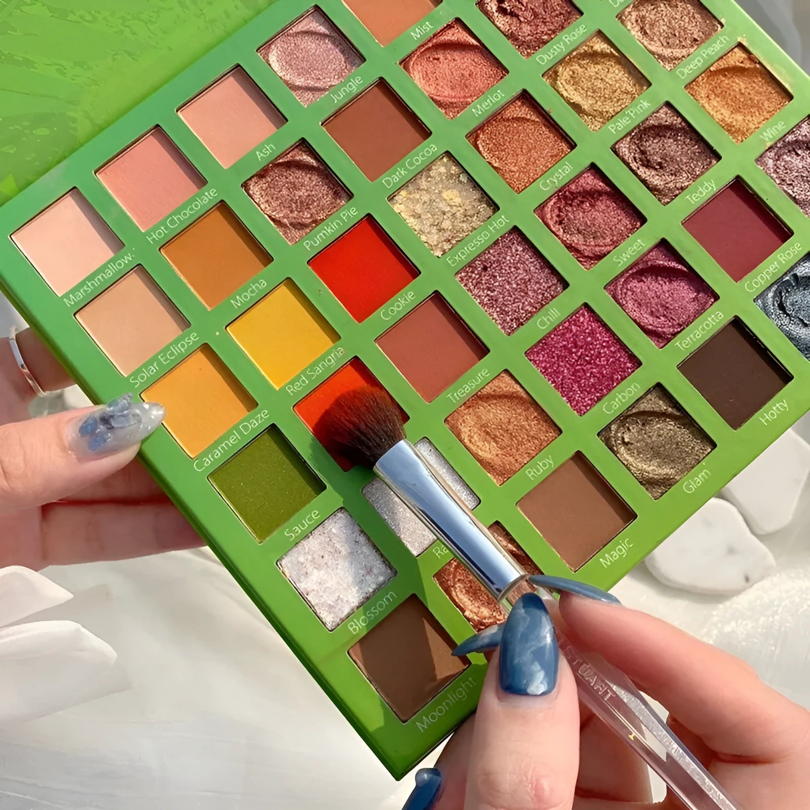 42-colour eyeshadow palette with potato and matte textures, compact case, green style, smooth shiny and matte powders