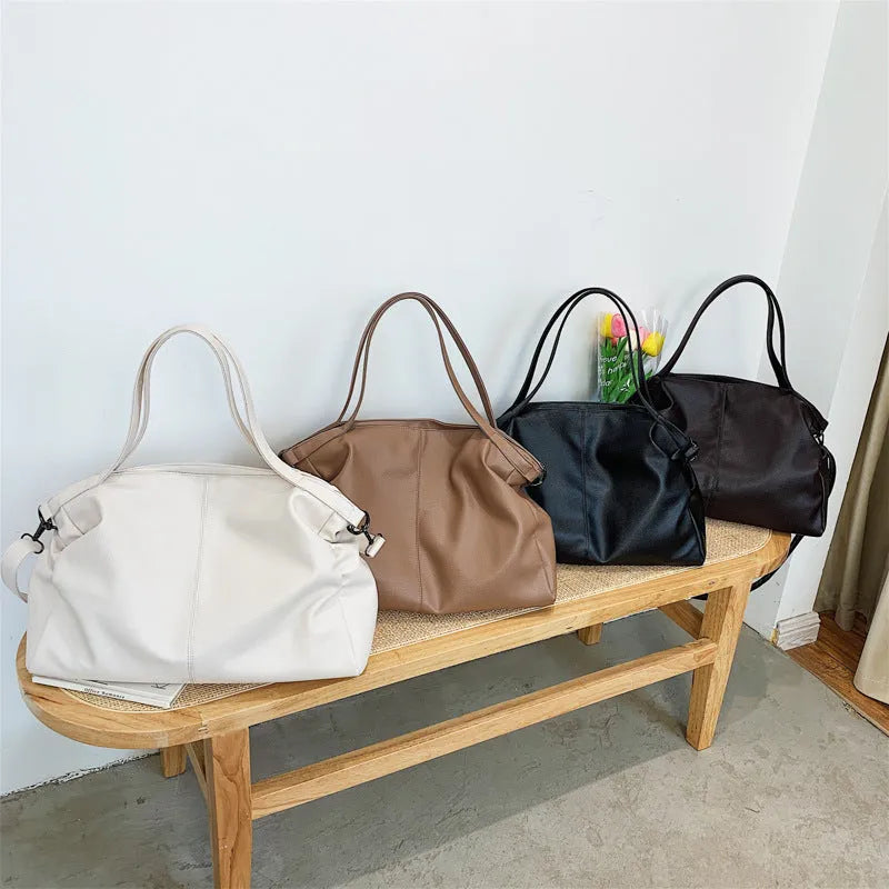 Large soft surface PU messenger tote bag in black with shoulder strap and zipper