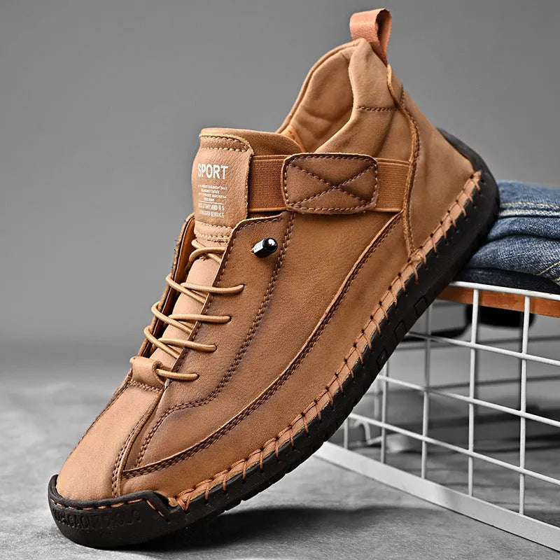Men's mid-top Martin boot in a solid colour with elastic band, round toe, and tooling stitching on the rubber sole.