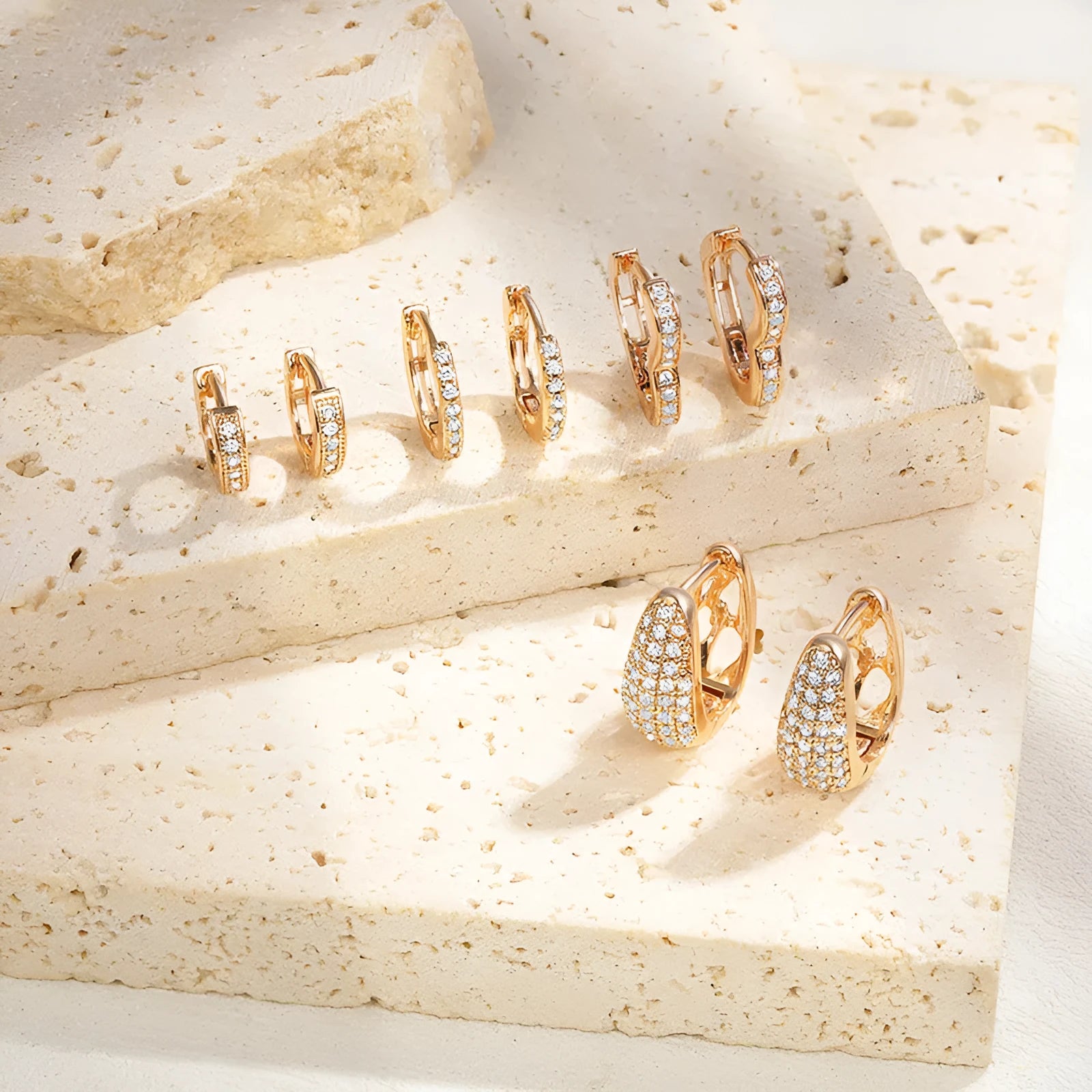 Brass gold plated heart shape zircon ear clip earrings with gang drill detailing on copper base