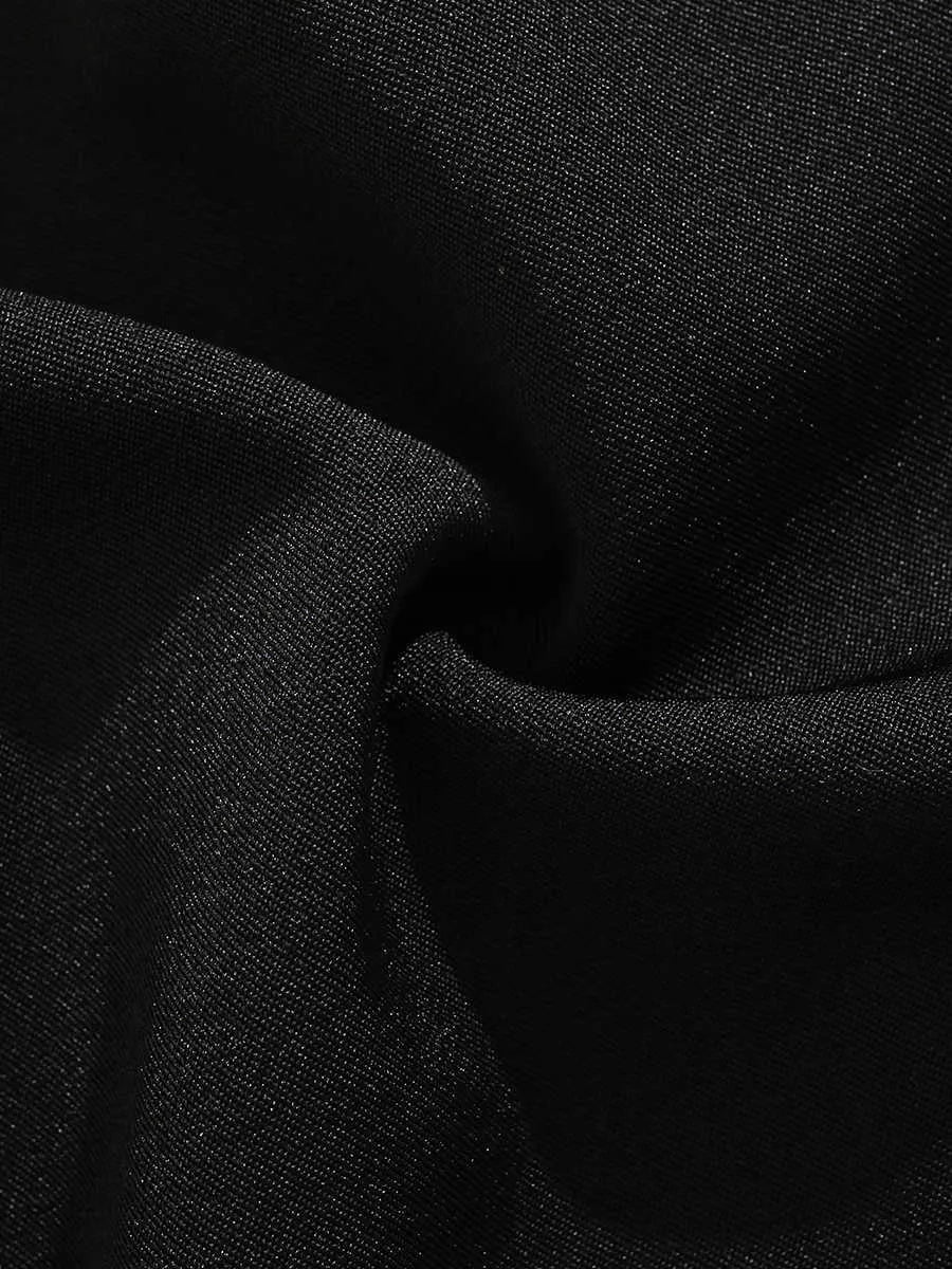 Black loose-fit men's shorts with a semi-elastic waistband and zipper fly, shown above the knee.