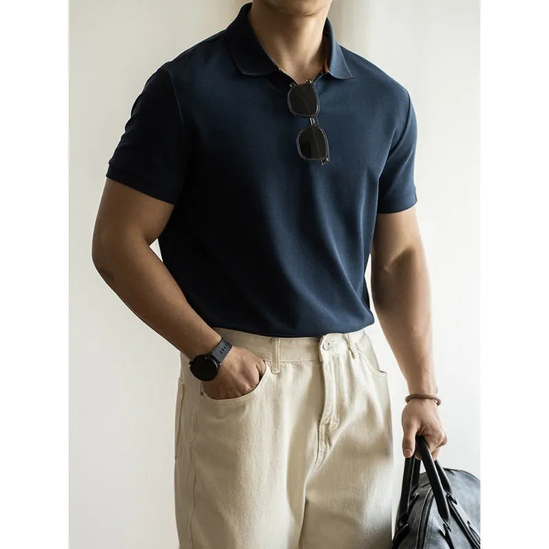 Blue cotton blend polo shirt with short sleeves displayed front view