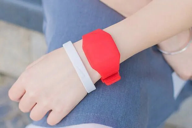 Square digital electronic watch with touch screen on a coloured PU strap.