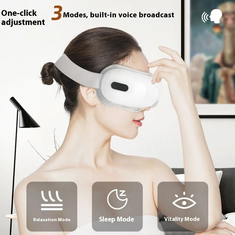 White rechargeable eye massager with airbag compression and heat therapy shown front view.