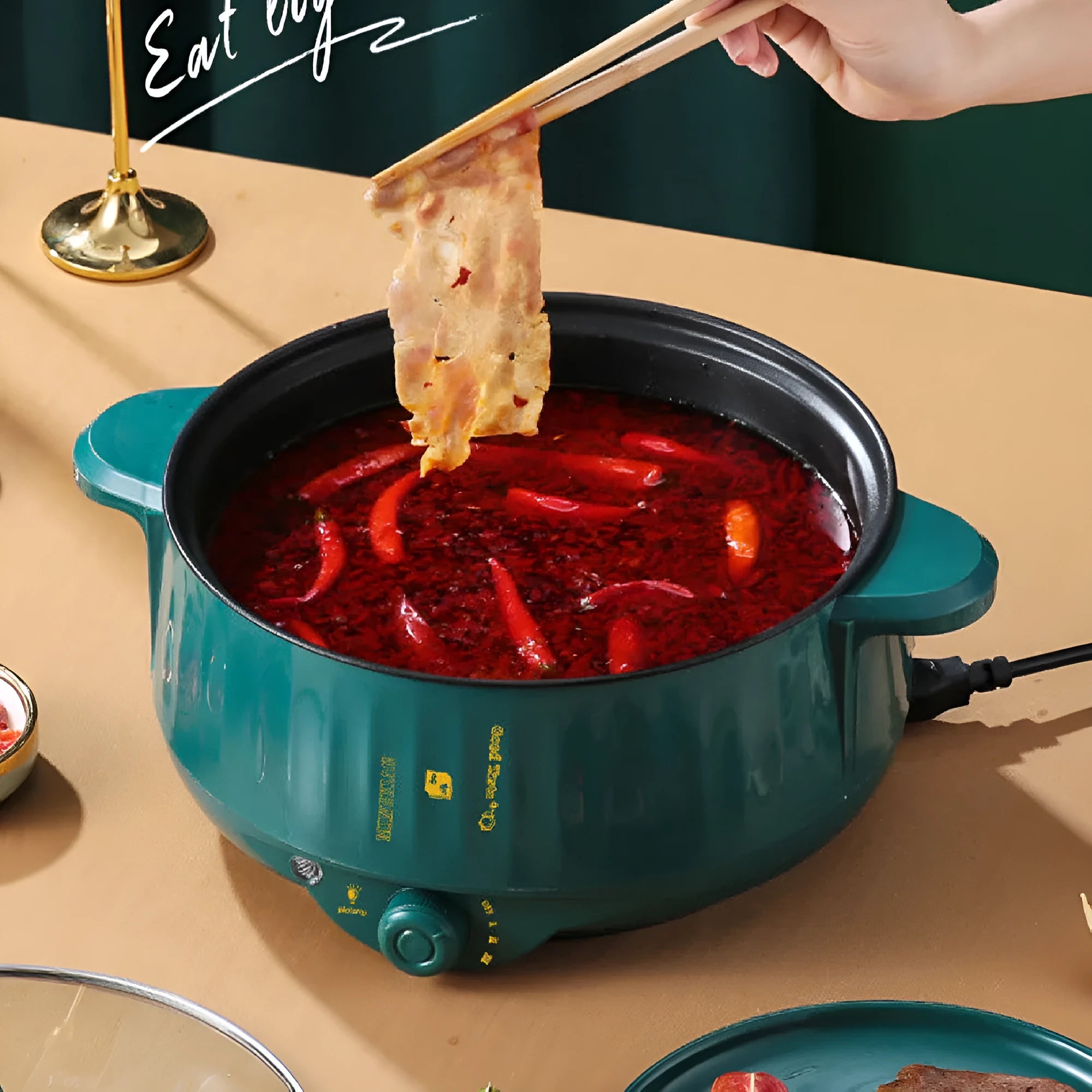 Integrated electric cooking pot with non-stick interior and stainless steel body in white or green finish