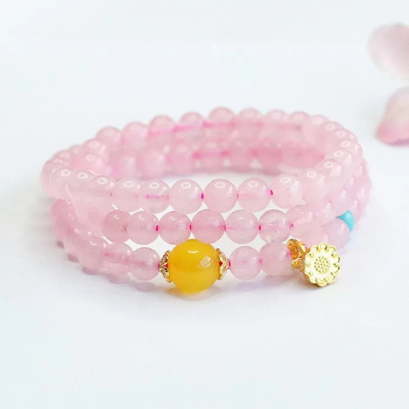 Pink artificial crystal multi-circle bracelet featuring classic Pi Xiu design on white background