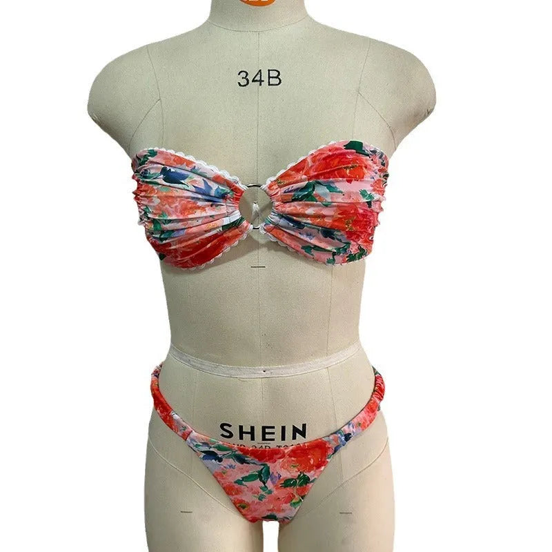 Floral print lace trim bikini top in blue, with matching short, shown on a mannequin.