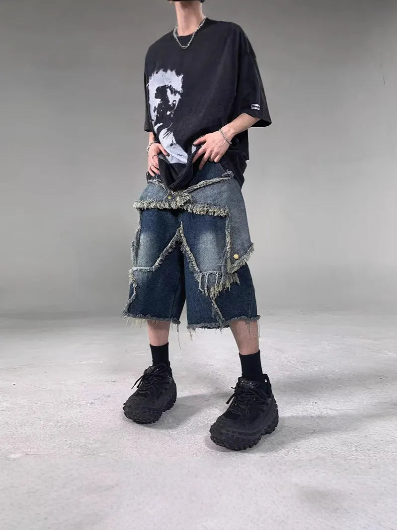 Men's blue denim shorts with loose retro fit, frayed details, and five-pointed star motif on micro-elastic cotton fabric